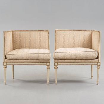 A pair of Royal Gustavian late 18th century corner chairs by Erik Öhrmark, master in Stockholm 1777-1813.