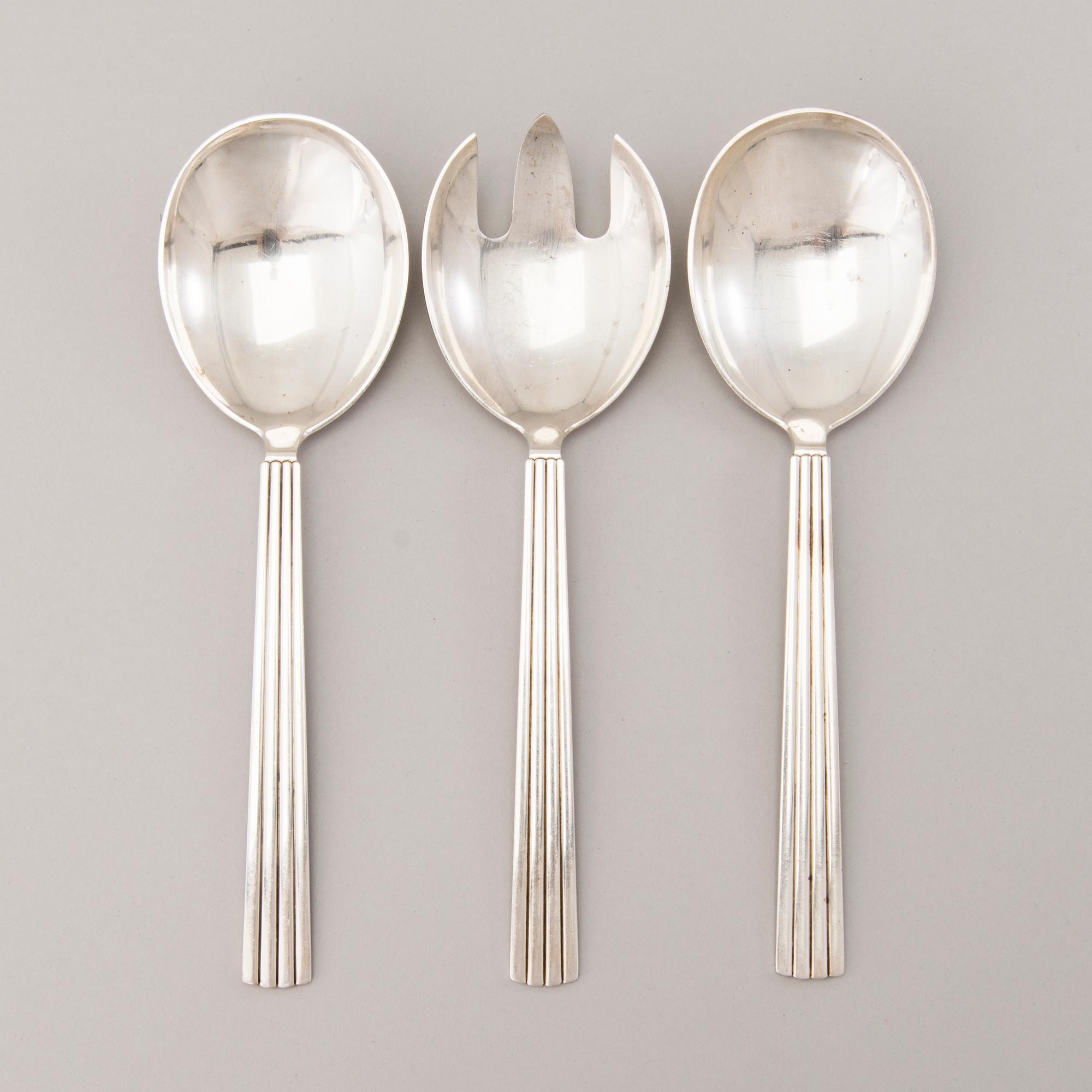 A 106 PIECE SILVER 'Bernadotte' cutlery set for George Jensen Denmark 1945-1977.