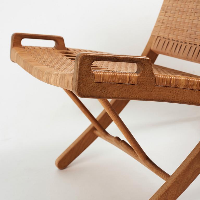 Hans J. Wegner, a pair oak and rattan "model 512" folding chairs by Johannes Hansen, Denmark 1950-60's.