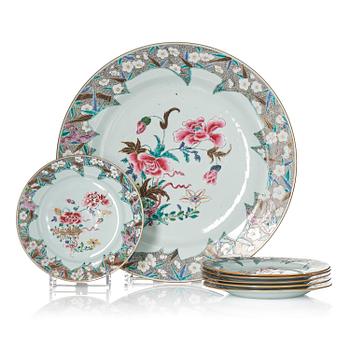 1103. A famille rose serving dish and six dinner plates, Qing dynasty, Qianlong (1736-95).