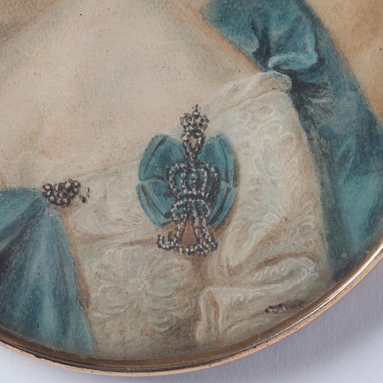 Noblewoman with a diamond-studded Lady-in-waiting monogram.