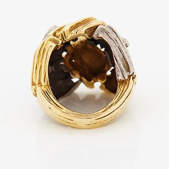 An 18K gold and platinum ring.