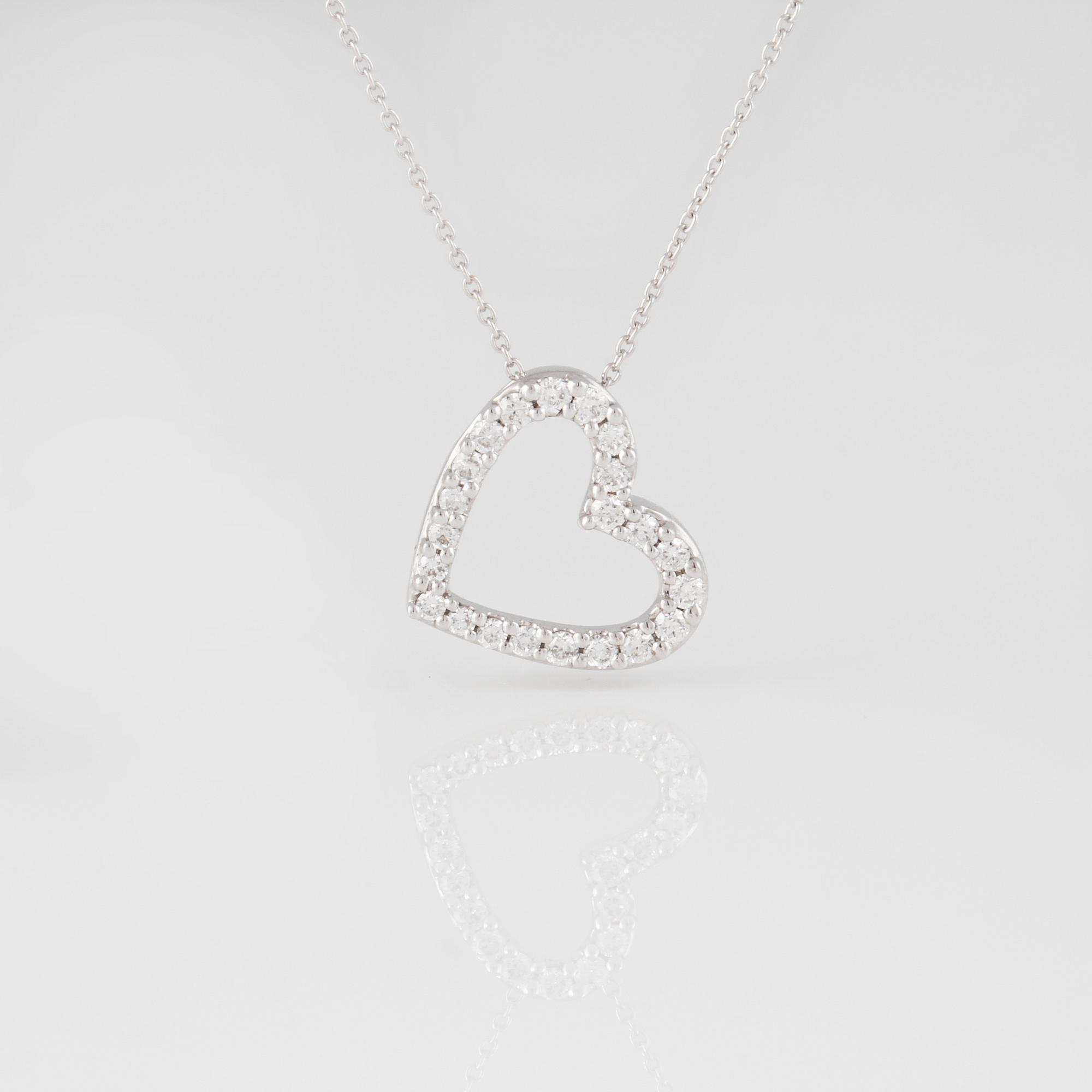 HÄNGE, 18K vitguld med briljantslipade diamanter ca 0.25 ct. Vikt 2,2 gram.