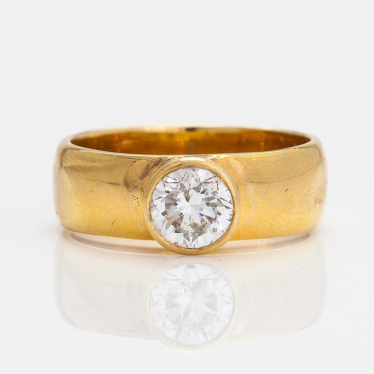 An 18K gold ring, with a brilliant-cut diamond approximately 1.20 ct according to certificate.