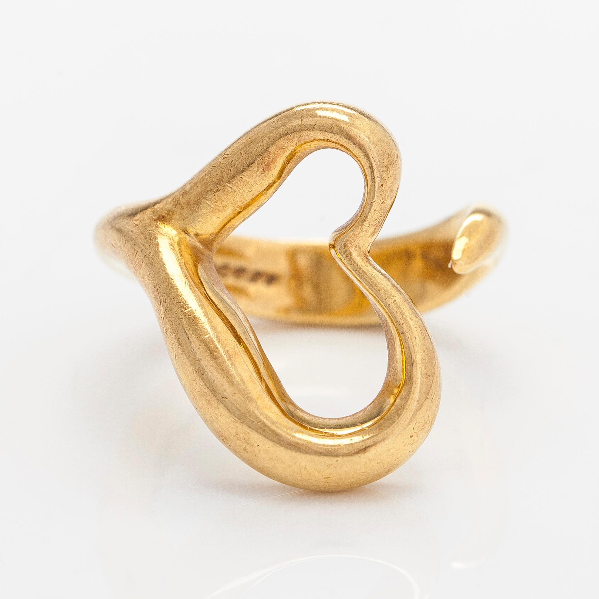 Tiffany & Co, Elsa Peretti, an 18K gold 'Open Heart' ring.