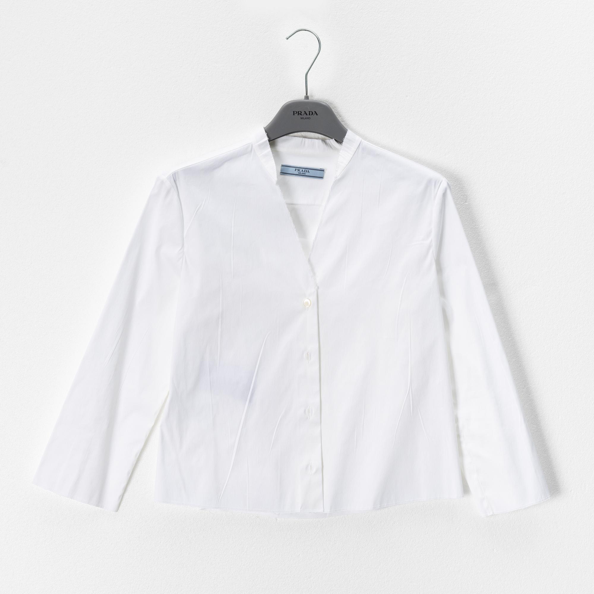 Prada, two white blouses, size 38.