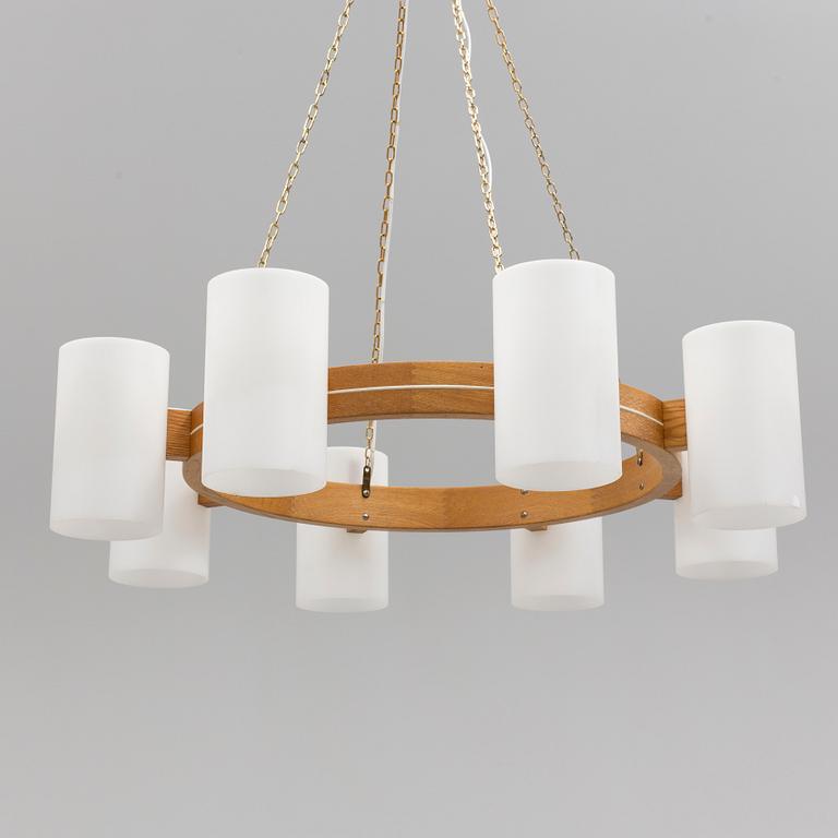 UNO AND ÖSTEN KRISTIANSSON, A Luxus oak ceiling light, second half of the 20th Century.