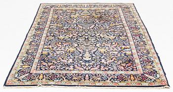 A Oriental carpet, c. 240 x 151 cm.