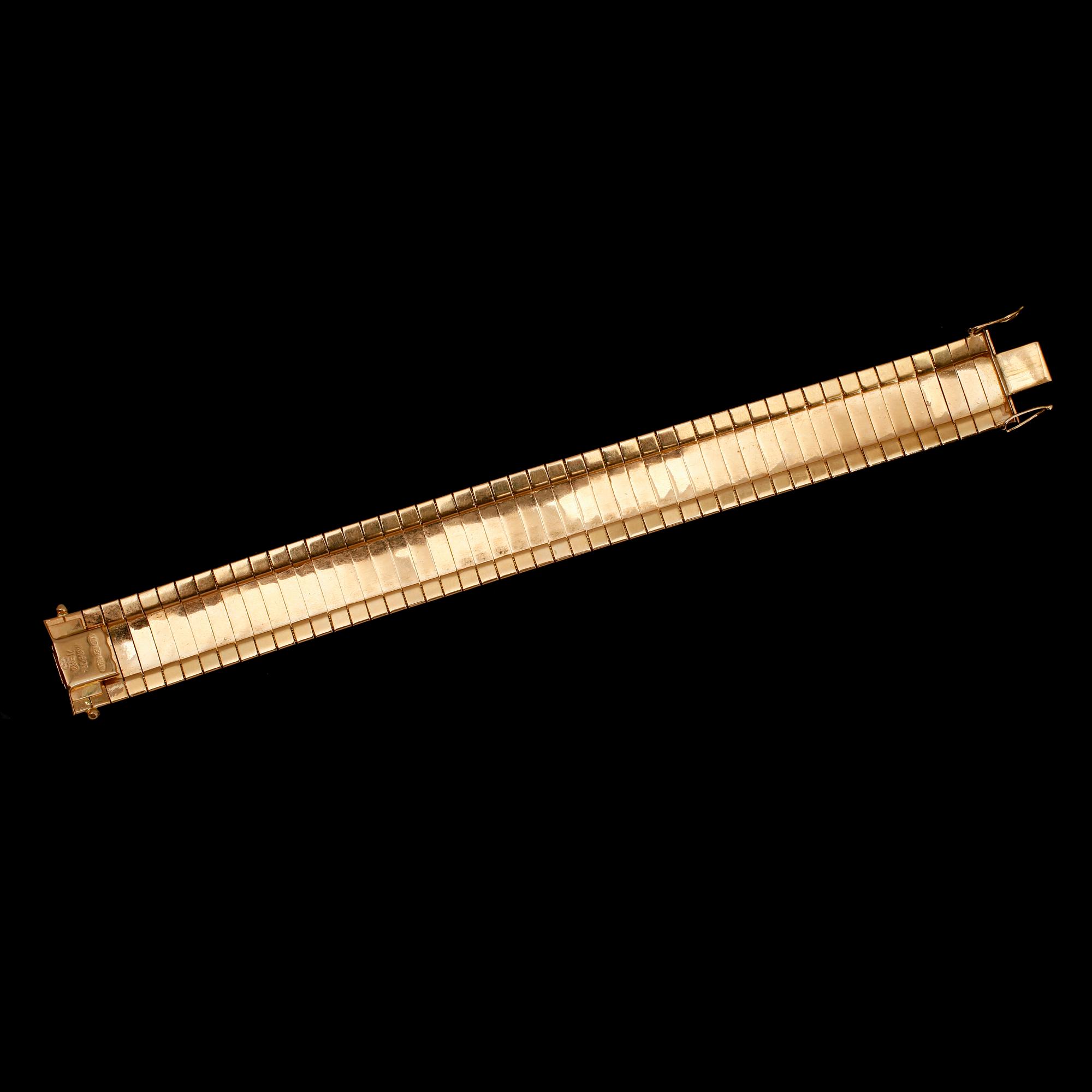 ARMBAND, 18 k guld, fantasimodell. Vikt ca 52 g.