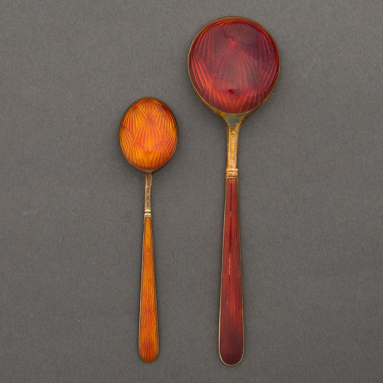 Fourteen Finnish sterling silver and red enamel spoons by Tillander, Helsinki 1950-70s.