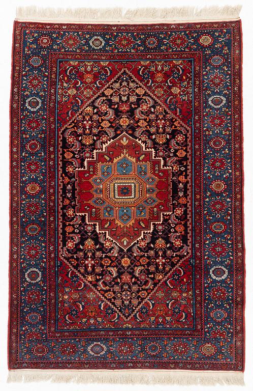 An oriental rug, old, c. 204 x 139 cm.