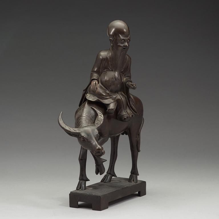 A large bronze Laozi and buffalo incense burner and cover, Qing dynasty (1644-1912).