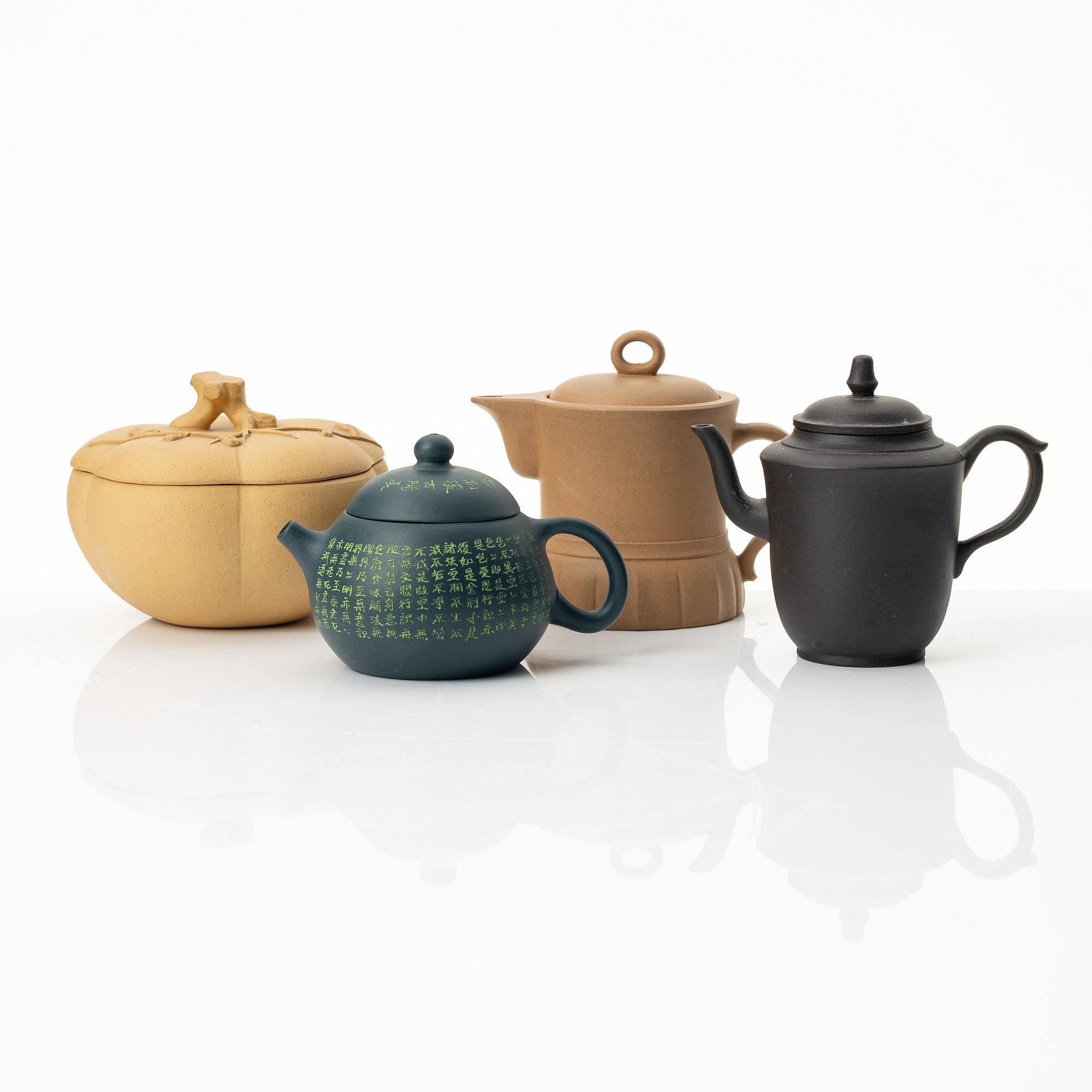 A group of three yixing teapots and a box with cover, China, 1970/80s.