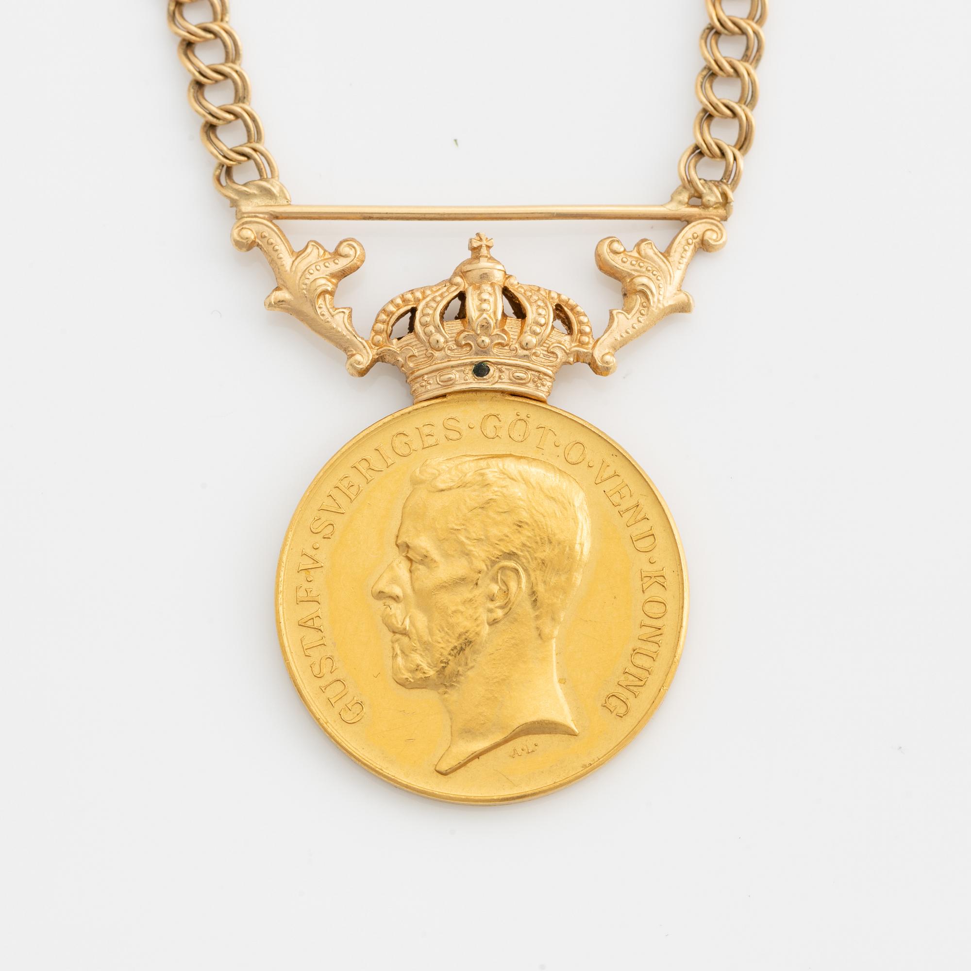 Medalj, "för nit och redlighet i rikets tjänst", guld, med senare kedja i 18K guld.