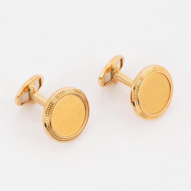 Patek Philippe, slipsnål och manschettknappar.