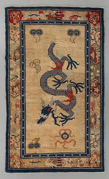 A semiantique Chinese Baotou carpet ca 206 x 118 cm.