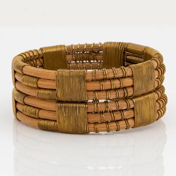 Vivianna Torun Bülow-Hübe, a rattan and brass bangle, executed in her own workshop, 1945-50's.