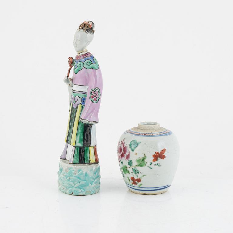 A Chinese famille rose porcelain figure and a jar, Qing dynasty (1644-1912).