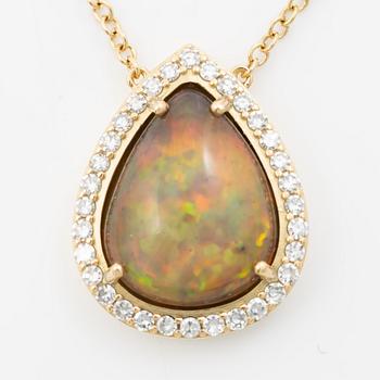 Necklace in 18K gold with a drop-shaped opal and octagon-cut diamonds.