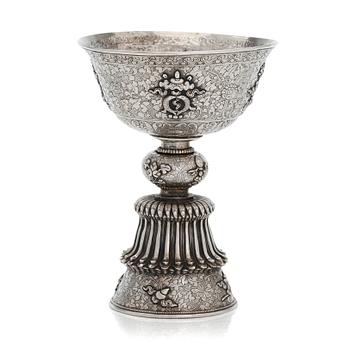 A Tibetan butter lamp, silver, early 19th century.