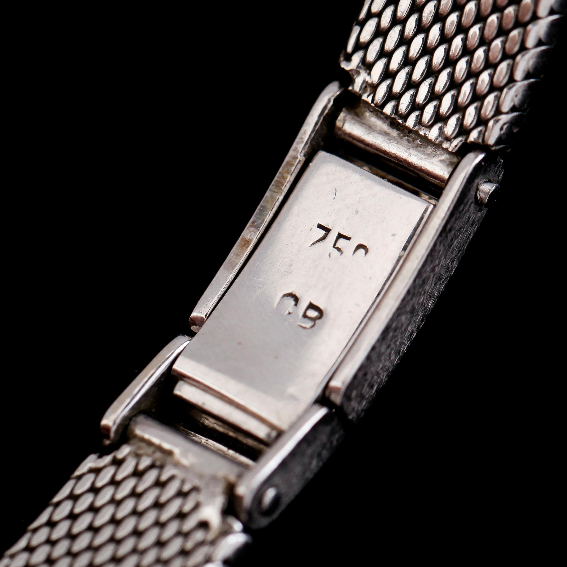 DAMARMBANDSUR, Bucherer, 18K vitguld, briljantslipade diamanter tot ca 4.62 ct. Total vikt ca 37 g.