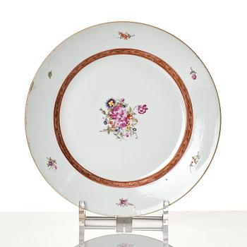 A set of 18 Chinese Export famille rose dinner plates, Qing dynasty, Qianlong (1736-95).