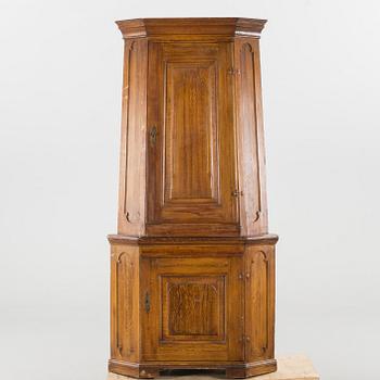 A corner cabinet, later part of the 16th century.