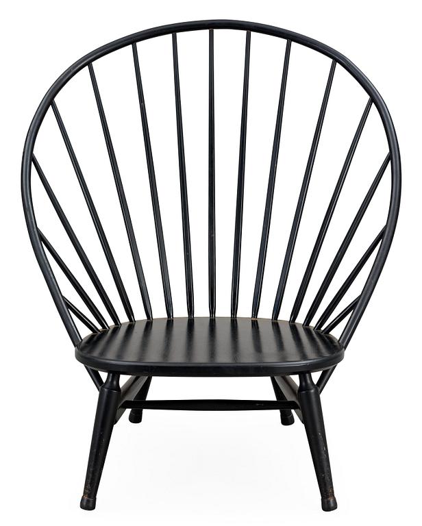 A Sven Engström & Gunnar Myrstrand black lacquered easy chair, 'Bågen', Nässjö Stolfabrik, Sweden 1950's.