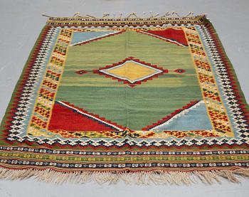 A CARPET, a kilim, a semi-antique/old Qashqai, ca 227,5-230 x 139-147,5 cm.