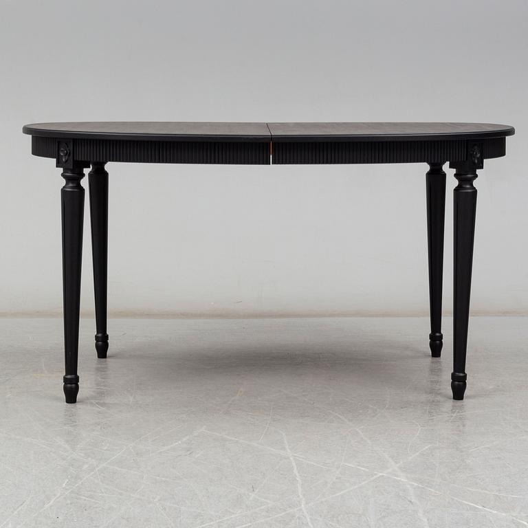 A second half of the 20th century Gustavian style dining table.