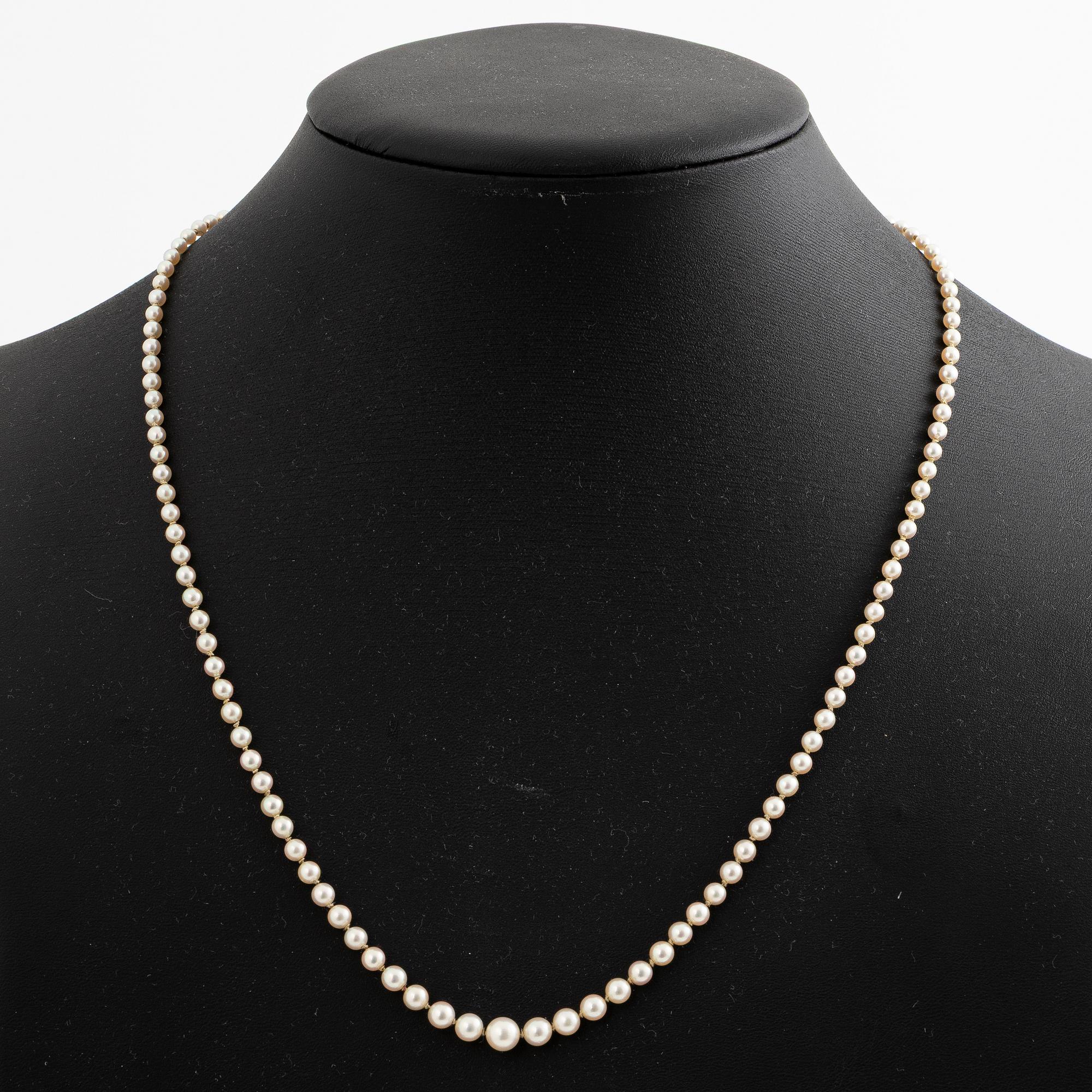 Collier odlade pärlor lås 18K guld.