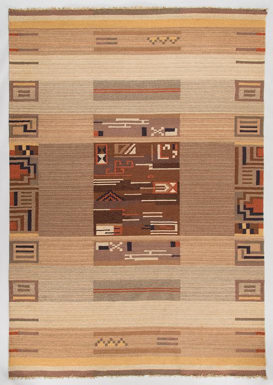 Impi Sotavalta, attributed, a 1930s Finnish flat weave carpet for Kodiksamin Mattokutomo. Circa 293 x 205 cm.