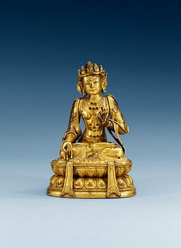 1486. A gilt copper figure of Buddha, late Qing dynasty, 19th Century.