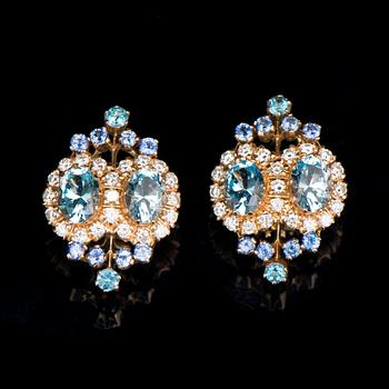 A PAIR OF EARRINGS, facetted topazes and sapphires, brilliant cut diamonds, 18K gold. Kari Hirvonen, Helsinki Finland.