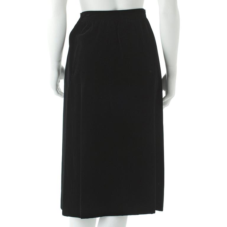 YVES SAINT LAURENT, a black velvet skirt.