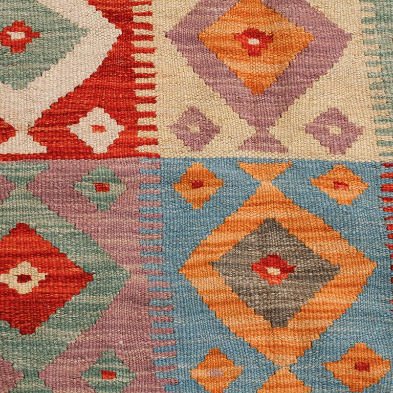 A kelim rug, 235 x 163 cm.