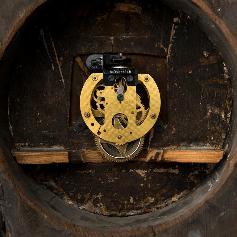 A 18th century wall clock.