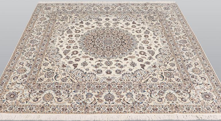 A Nain part silk carpet, 210 x 200 cm.