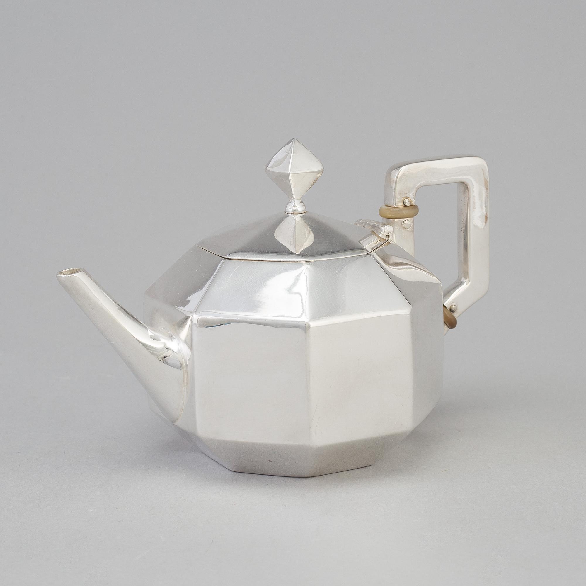 A Swedish octagonal shape small silver teapot, maker's mark K Anderson, Stockholm 1898.