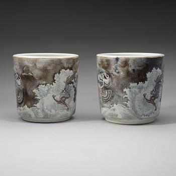 A pair of Chinese enamelled porcelain flower/scroll pots, first half of 20th Century.