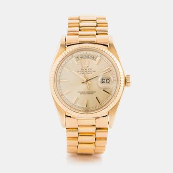 Rolex, Day-Date. <b>Case size:</b> 36 mm
<b>Material:</b> 18K gold
<b>Movem...