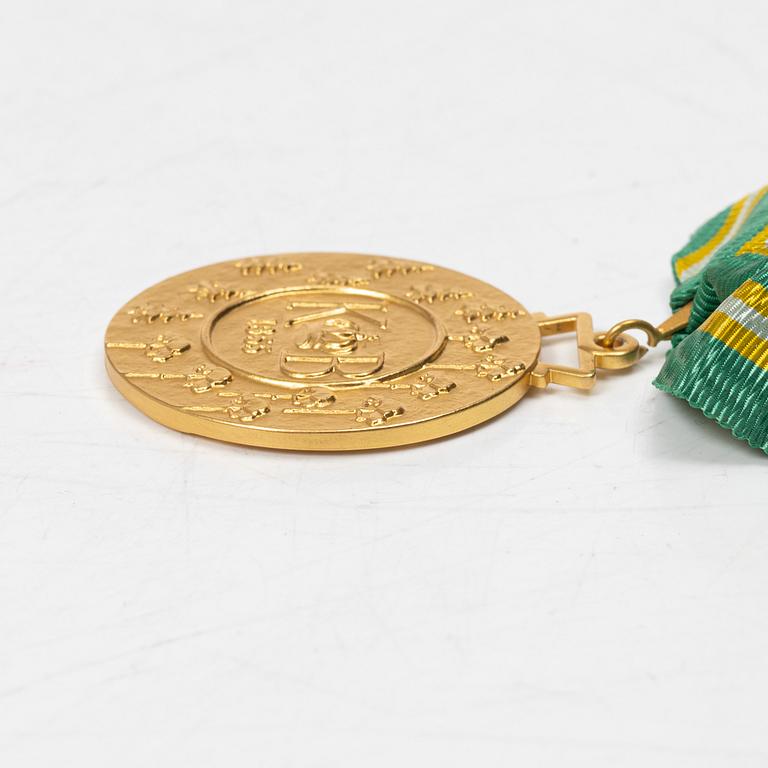 An 18K gold medal, Sporrong, Stockholm 1958.