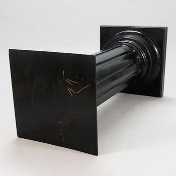 A black lacquered wooden pedestal from around year 1900.
