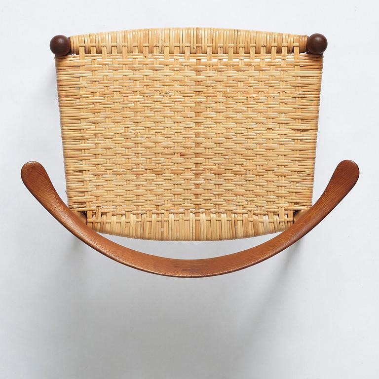 Hans J. Wegner, a teak, oak and cane "Cowhorn chair", JH 505, Johannes Hansen, Denmark 1950-60's.