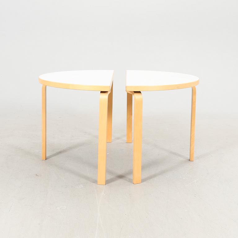 Alvar Aalto, a pair of model no 95 tables Artek Finland.
