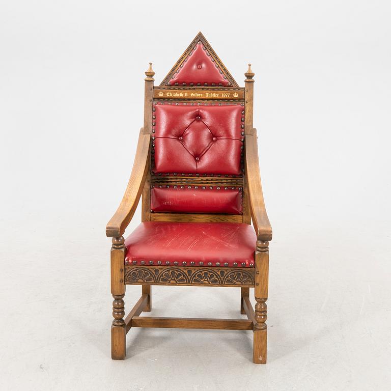 A oak and leather throne commemorating Elizabeth II silver jubilee 1977 by Wood Bros. Ltd.