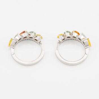 A pair of 14K gold earrings with multicoloured sapphires and diamonds.