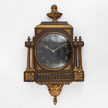 A Gustavian wall clock, 19th century.