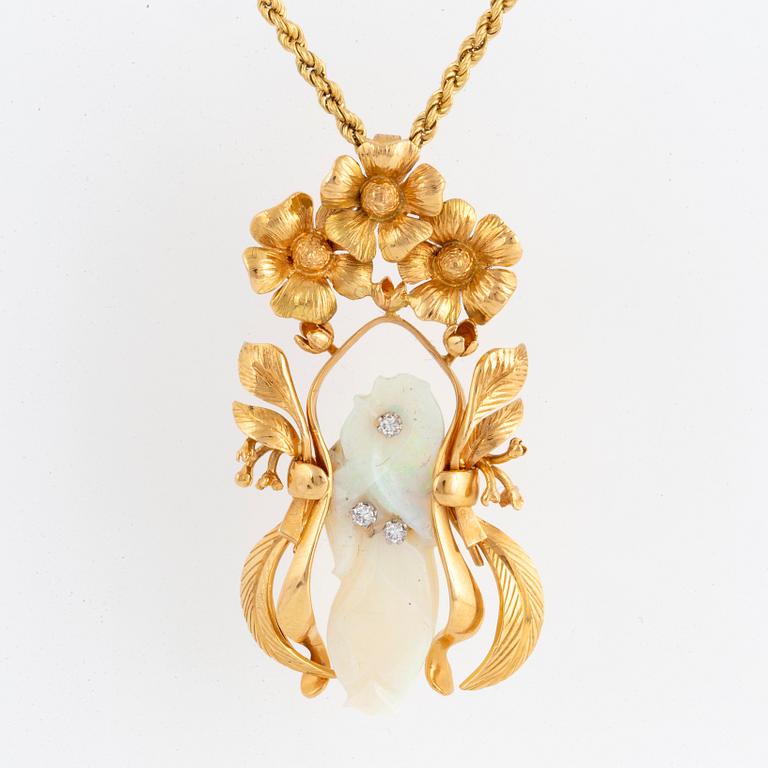 A Siegfried Egger design necklace with carved opal and brilliant-cut diamonds.