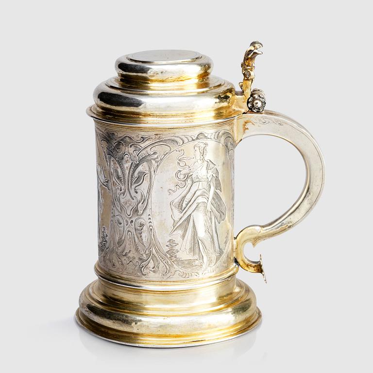 A German parcel-gilt silver tankard, mark of Walter Kopman, Hamburg (1649-1688).